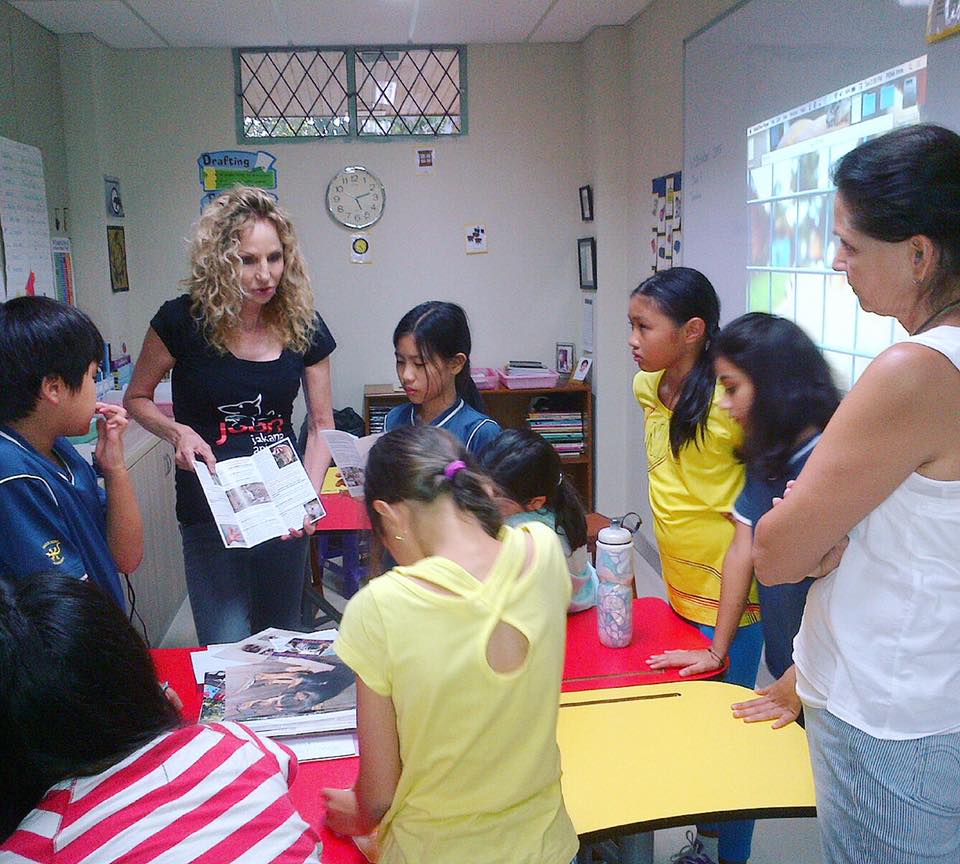 An educational outreach with elementary school students from Jakarta International School (JIS).